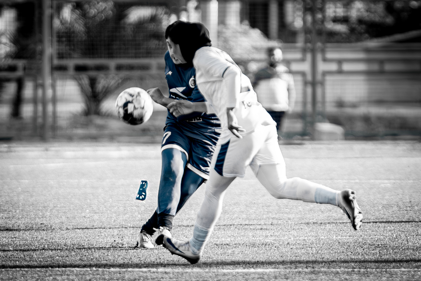 During a Women’s Premier League match between Khatoun Bam and Malavan, a fierce collision sent a Bam player’s shin guard flying, capturing the intensity of the game.